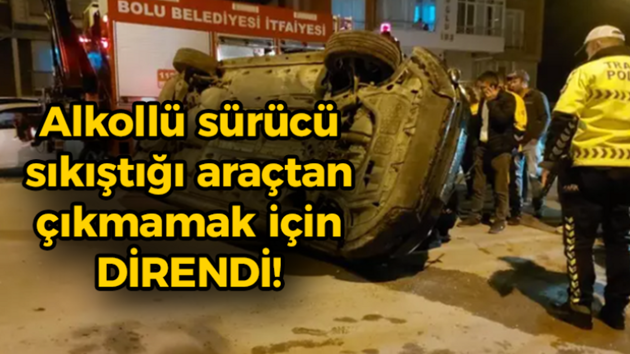 Alkollü sürücü sıkıştığı araçtan çıkmamak için direndi