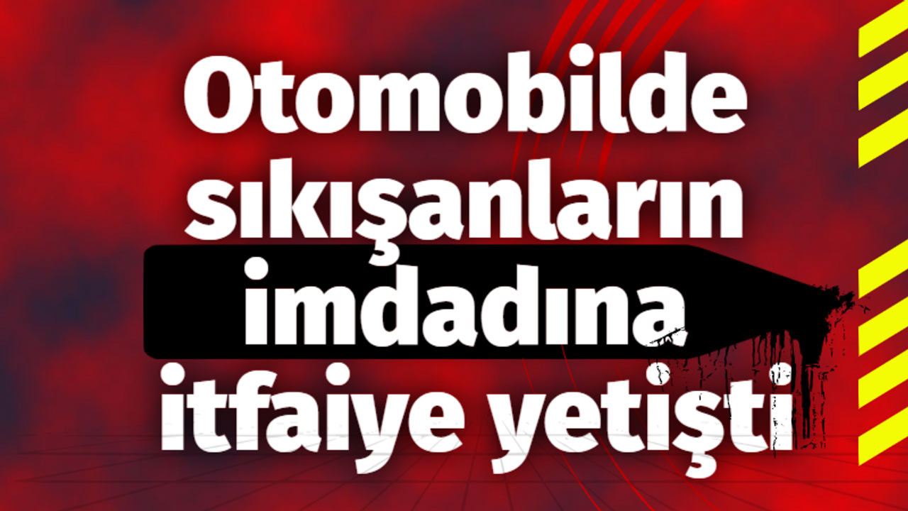 Hurdaya dönen otomobilde sıkışanların imdadına itfaiye yetişti