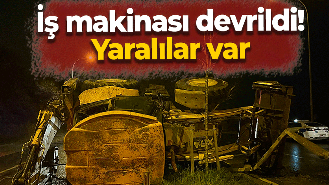 Trafikteki iş makinası devrildi!