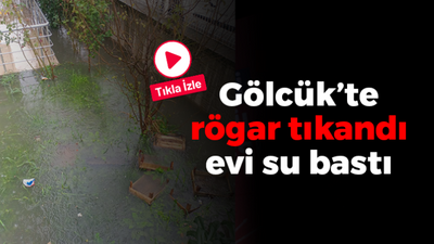 Rögarı tıkayan pazar artıkları su baskınına neden oldu