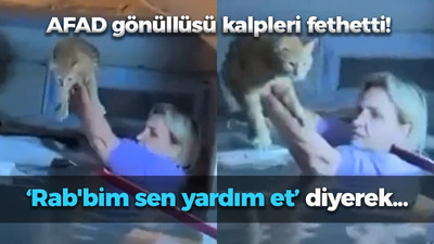 AFAD gönüllüsü kalpleri fethetti! "Rab'bim sen yardım et" diyerek boyuna kadar suya girdi